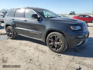 2015 Jeep Grand Cherokee SRT with VIN 1C4RJFDJ7FC613234, listed as a Copart auction lot 47537205 with 125,275 mi miles and Clean Title. Bid and sale history available at carsss.com. Image 4.