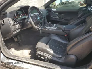 2016 BMW M6 z VIN WBS6J9C51GD934487, wystawiony jako Copart lot #45756775 z przebiegiem 62 179 mil mil oraz Szkoda całkowita • Salvage title. Historia ofert i sprzedaży dostępna na DreamBid. Obrazek 7.