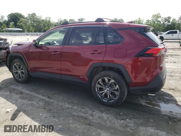 2023 Toyota RAV4 Hybrid XLE Premium with VIN JTMB6RFV2PD541262, listed as a Copart auction lot 60106845 with 32,447 mi miles and Salvage title. Bid and sale history available at DreamBid. Image 2.