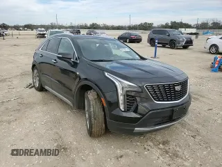 2022 Cadillac XT4 FWD Premium Luxury z VIN 1GYFZCR42NF135325, wystawiony jako Copart lot #43133215 z przebiegiem 48 998 mil mil oraz Szkoda całkowita • Salvage title. Historia ofert i sprzedaży dostępna na DreamBid. Obrazek 12.