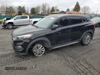 2017 Hyundai Tucson SE with VIN KM8J33A4XHU460779, listed as a Copart auction lot 52042115 with 96,459 mi miles and Salvage Title. Bid and sale history available at DreamBid. Image 1.