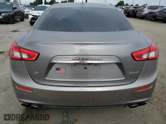 2016 Maserati Ghibli S Q4 z VIN ZAM57RTA6G1172334, wystawiony jako Copart lot #56601575 z przebiegiem 109 524 mil mil oraz Szkody całkowita. Historia ofert i sprzedaży dostępna na DreamBid. Obrazek 6.