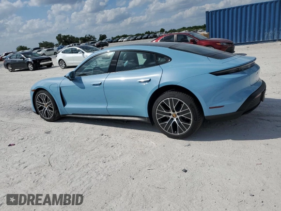 2024 Porsche Taycan z VIN WP0AA2Y17RSA10720, wystawiony jako Copart lot #50988475 z przebiegiem 2 836 mil mil oraz Szkoda całkowita • Salvage title. Historia ofert i sprzedaży dostępna na DreamBid. Obrazek 2.