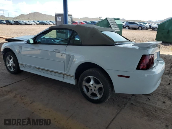 2001 Ford Mustang Deluxe z VIN 1FAFP44401F174830, wystawiony jako Copart lot #59810595 z przebiegiem Nie podano mil oraz Szkoda całkowita • Salvage title. Historia ofert i sprzedaży dostępna na DreamBid. Obrazek 2.