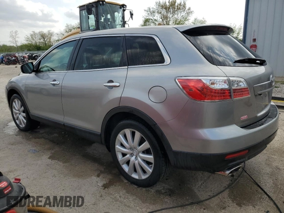 2010 Mazda CX-9 Grand Touring z VIN JM3TB3MA2A0210779, wystawiony jako Copart lot #54834665 z przebiegiem 164 358 mil mil oraz Szkoda całkowita • Salvage title. Historia ofert i sprzedaży dostępna na DreamBid. Obrazek 2.