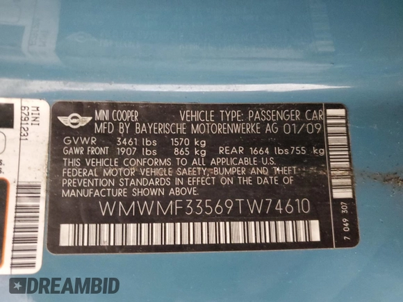 2009 MINI Hardtop with VIN WMWMF33569TW74610, listed as a Copart auction lot 54889805 with 147,533 mi miles and Salvage Title. Bid and sale history available at DreamBid. Image 12.