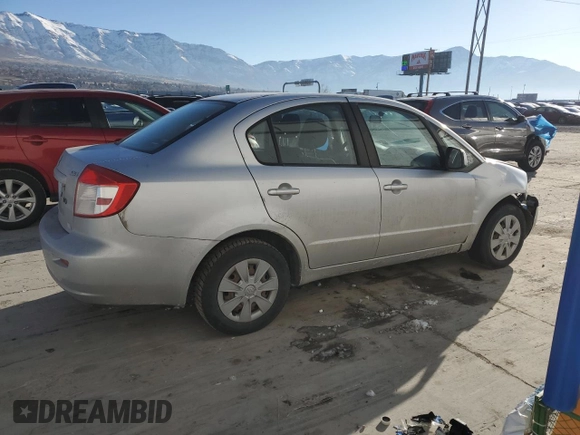 2010 Suzuki SX4 LE with VIN JS2YC5A27A6300498, listed as a Copart auction lot 43036655 with 237,647 mi miles and Salvage Title. Bid and sale history available at carsss.com. Image 3.