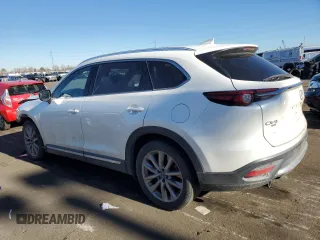 2020 Mazda CX-9 Grand Touring with VIN JM3TCBDY8L0402974, listed as a Copart auction lot 82790654 with 105,220 mi miles and Salvage Title. Bid and sale history available at carsss.com. Image 2.