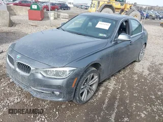 2017 BMW 3 Series 330i xDrive with VIN WBA8D9G30HNU65630, listed as a IAAI auction lot 41654369 with 150,962 mi miles. Bid and sale history available at carsss.com. Image 2.