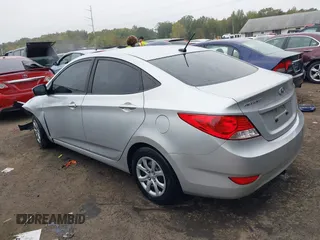 2012 Hyundai Accent GLS z VIN KMHCT4AE8CU197739, wystawiony jako IAAI lot #37738877 z przebiegiem 158 688 mil mil oraz . Historia ofert i sprzedaży dostępna na DreamBid. Obrazek 3.