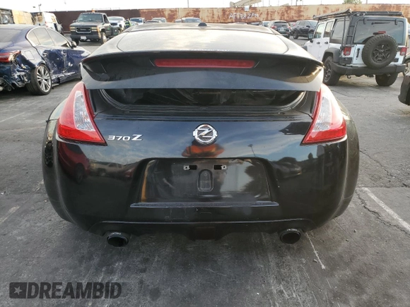 2011 Nissan 370Z Touring with VIN JN1AZ4EH6BM550267, listed as a Copart auction lot 82245804 with 124,466 mi miles and Salvage Title. Bid and sale history available at carsss.com. Image 6.