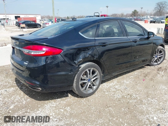 2017 Ford Fusion SE with VIN 3FA6P0H90HR253779, listed as a IAAI auction lot 41893736 with 165,995 mi miles. Bid and sale history available at carsss.com. Image 4.