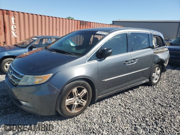 2012 Honda Odyssey Touring with VIN 5FNRL5H93CB028282, listed as a Copart auction lot 52322015 with 206,582 mi miles and Salvage Title. Bid and sale history available at carsss.com. Image 1.