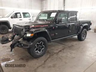 2021 Jeep Gladiator Rubicon with VIN 1C6JJTBGXML529108, listed as a IAAI auction lot 42139924 with 32,204 mi miles and . Bid and sale history available at DreamBid. Image 18.