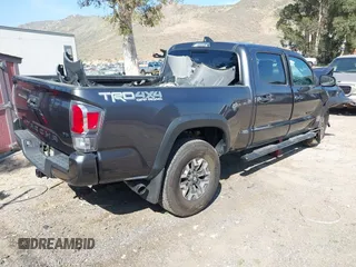 2021 Toyota Tacoma SR5 z VIN 3TMDZ5BN8MM117163, wystawiony jako IAAI lot #42070540 z przebiegiem 12 790 mil mil oraz . Historia ofert i sprzedaży dostępna na DreamBid. Obrazek 4.