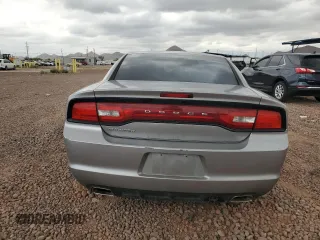 2013 Dodge Charger SE z VIN 2C3CDXBG2DH654105, wystawiony jako Copart lot #56041455 z przebiegiem 198 926 mil mil oraz Szkody całkowita. Historia ofert i sprzedaży dostępna na DreamBid. Obrazek 6.