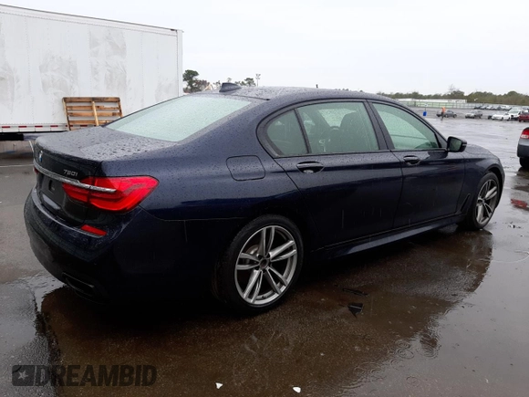 2016 BMW 7 Series 750i xDrive with VIN WBA7F2C58GG416876, listed as a Copart auction lot 37267523 with 77,741 mi miles. Bid and sale history available at carsss.com. Image 3.