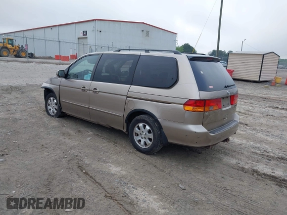 2003 Honda Odyssey EX z VIN 2HKRL18683H505577, wystawiony jako IAAI lot #42118231 z przebiegiem 234 329 mil mil oraz . Historia ofert i sprzedaży dostępna na DreamBid. Obrazek 3.