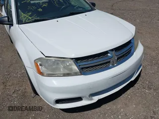 2013 Dodge Avenger SE with VIN 1C3CDZABXDN551796, listed as a IAAI auction lot 42142302 with 999,999 mi miles. Bid and sale history available at carsss.com. Image 6.