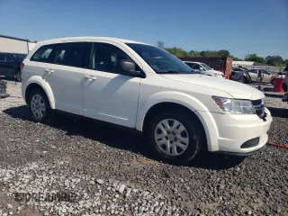2015 Dodge Journey American Value with VIN 3C4PDCAB4FT531380, listed as a Copart auction lot 53103135 with 164,802 mi miles and Salvage Title. Bid and sale history available at DreamBid. Image 4.