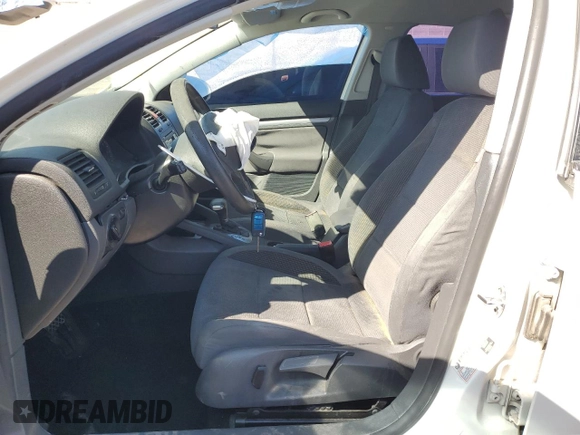2009 Volkswagen Jetta S with VIN 3VWJZ71K99M059879, listed as a Copart auction lot 47478145 with 154,359 mi miles and Salvage title. Bid and sale history available at DreamBid. Image 7.