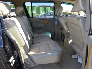2006 Infiniti QX56 with VIN 5N3AA08C56N809993, listed as a IAAI auction lot 42109180 with 161,082 mi miles. Bid and sale history available at carsss.com. Image 8.