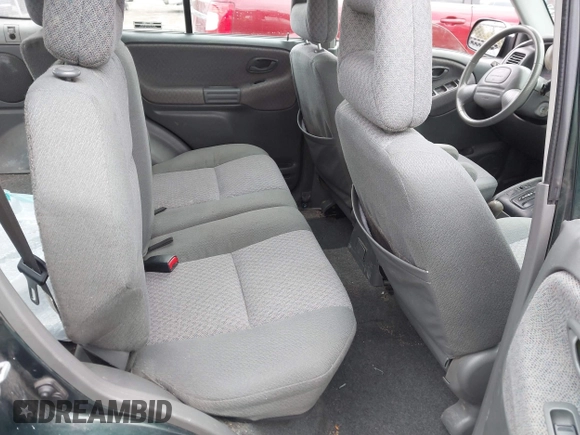 2002 Chevrolet Tracker z VIN 2CNBJ13C126946857, wystawiony jako IAAI lot #41491975 z przebiegiem Nie podano mil oraz . Historia ofert i sprzedaży dostępna na DreamBid. Obrazek 8.