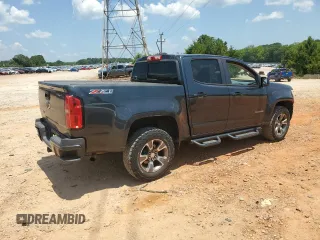 2018 Chevrolet Colorado 4WD Z71 z VIN 1GCGTDEN7J1110282, wystawiony jako Copart lot #61945695 z przebiegiem 144 792 mil mil oraz Szkoda całkowita • Salvage title. Historia ofert i sprzedaży dostępna na DreamBid. Obrazek 3.