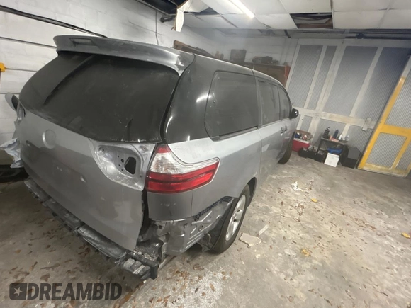 2015 Toyota Sienna L with VIN 5TDZK3DC5FS623224, listed as a Copart auction lot 54958485 with 82,419 mi miles and Salvage Title. Bid and sale history available at carsss.com. Image 4.