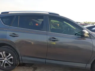 2016 Toyota RAV4 LE with VIN JTMZFREV5GJ097330, listed as a IAAI auction lot 41884397 with 107,699 mi miles. Bid and sale history available at carsss.com. Image 13.