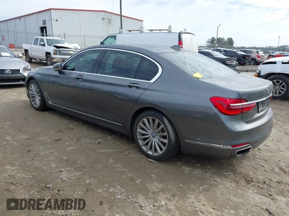 2017 BMW 7 Series 740i with VIN WBA7E2C54HG740170, listed as a IAAI auction lot 41432578 with 110,893 mi miles and . Bid and sale history available at DreamBid. Image 3.