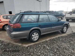 1996 Subaru Legacy Outback with VIN 4S3BG685XT7984194, listed as a Copart auction lot 77999224 with 130,804 mi miles and Salvage title. Bid and sale history available at DreamBid. Image 3.