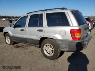 2002 Jeep Grand Cherokee Laredo with VIN 1J4GW48S22C242374, listed as a Copart auction lot 85676874 with 157,107 mi miles and Non Repairable. Bid and sale history available at carsss.com. Image 2.