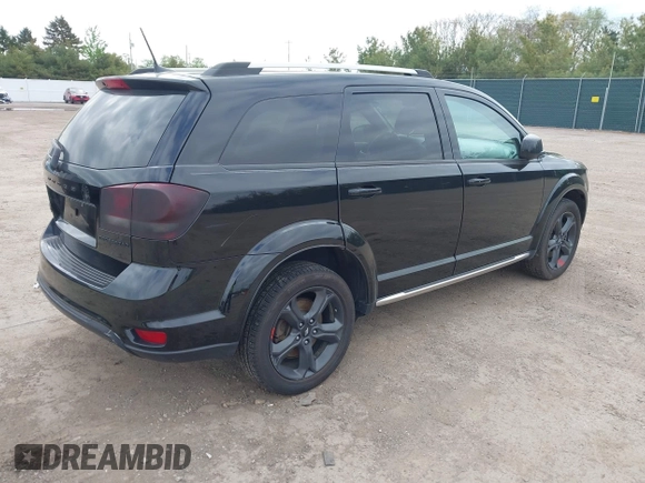 2018 Dodge Journey Crossroad z VIN 3C4PDDGG0JT449759, wystawiony jako IAAI lot #42210815 z przebiegiem 93 747 mil mil oraz . Historia ofert i sprzedaży dostępna na DreamBid. Obrazek 4.