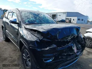 2019 Jeep Grand Cherokee Limited with VIN 1C4RJFBGXKC654555, listed as a IAAI auction lot 41310612 with 96,800 mi miles. Bid and sale history available at carsss.com. Image 1.