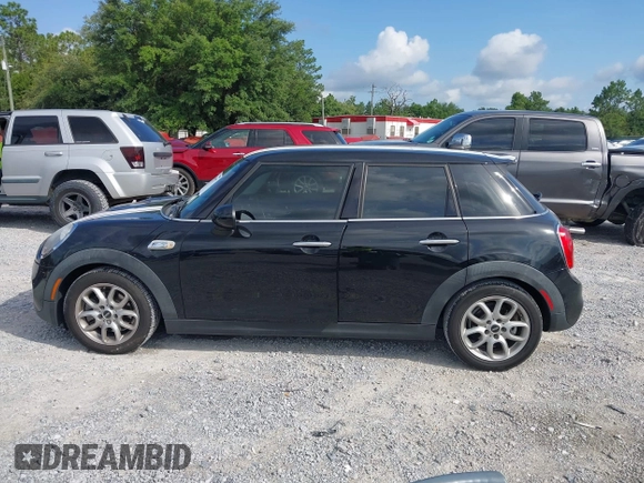 2016 MINI Hardtop 4 Door S z VIN WMWXU3C53G2D30807, wystawiony jako IAAI lot #42545577 z przebiegiem 86 952 mil mil oraz . Historia ofert i sprzedaży dostępna na DreamBid. Obrazek 14.