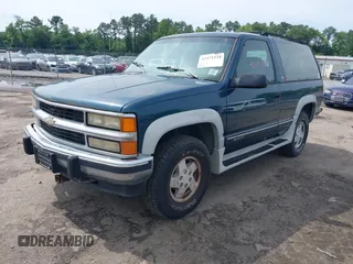 1994 Chevrolet Blazer z VIN 1GNEK18K0RJ366258, wystawiony jako IAAI lot #42471534 z przebiegiem 233 185 mil mil oraz . Historia ofert i sprzedaży dostępna na DreamBid. Obrazek 2.