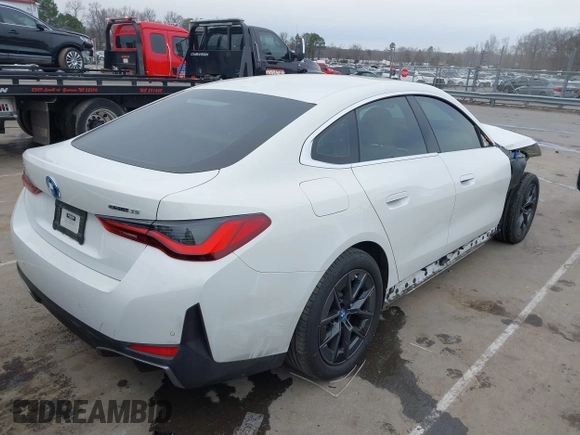 2023 BMW i4 eDrive35 z VIN WBY43AW04PFP70309, wystawiony jako IAAI lot #41745911 z przebiegiem 15 453 mil mil oraz . Historia ofert i sprzedaży dostępna na DreamBid. Obrazek 4.