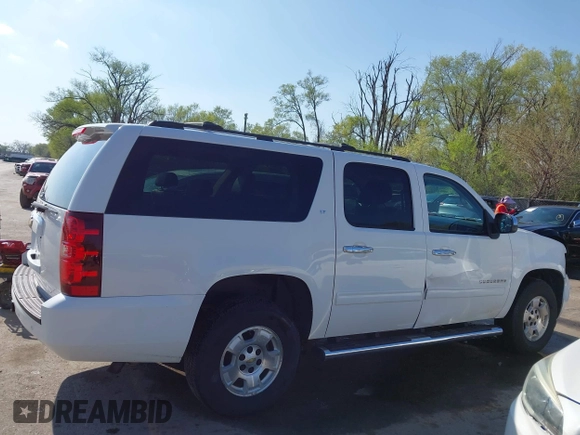 2013 Chevrolet Suburban LT with VIN 1GNSKJE75DR174167, listed as a IAAI auction lot 42005614 with 290,223 mi miles and . Bid and sale history available at DreamBid. Image 14.