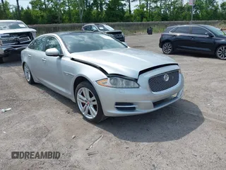 2014 Jaguar XJ Portfolio z VIN SAJWA2GZ2E8V74309, wystawiony jako IAAI lot #42286196 z przebiegiem Nie podano mil oraz . Historia ofert i sprzedaży dostępna na DreamBid. Obrazek 1.