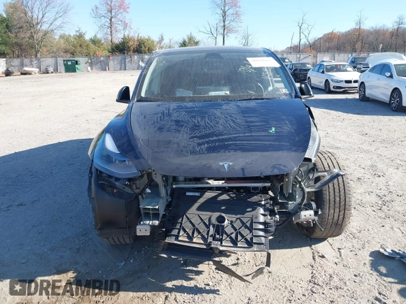 2024 Tesla Model Y with VIN 7SAYGDED3RF092501, listed as a IAAI auction lot 40820923 with 4,688 mi miles and . Bid and sale history available at DreamBid. Image 12.