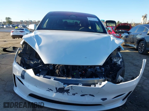 2022 Tesla Model X with VIN 7SAXCBE59NF364984, listed as a IAAI auction lot 41809256 with Not Provided miles and . Bid and sale history available at DreamBid. Image 13.