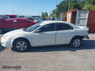 2005 Dodge Stratus Sdn SXT with VIN 1B3EL46X95N568803, listed as a IAAI auction lot 41467555 with 122,610 mi miles. Bid and sale history available at carsss.com. Image 15.