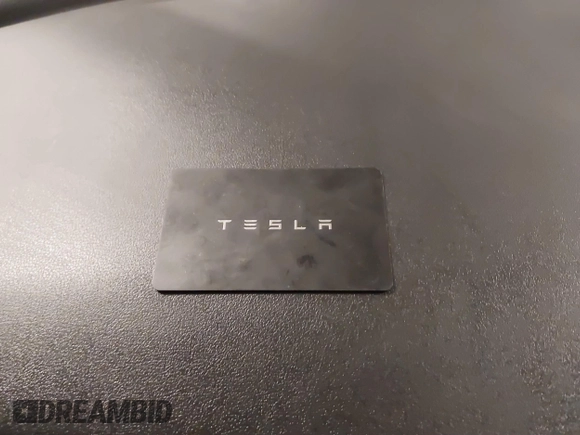 2018 Tesla Model 3 Long Range Battery with VIN 5YJ3E1EB5JF084446, listed as a IAAI auction lot 41209852 with 70,125 mi miles and . Bid and sale history available at DreamBid. Image 11.
