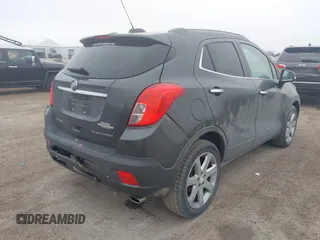2016 Buick Encore Leather with VIN KL4CJCSB7GB552548, listed as a IAAI auction lot 41606228 with 135,122 mi miles and . Bid and sale history available at DreamBid. Image 4.