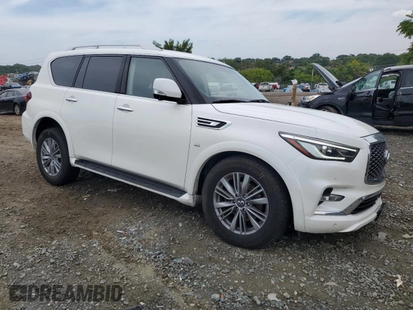 2019 Infiniti QX80 LUXE with VIN JN8AZ2NE6K9227058, listed as a Copart auction lot 64134284 with 89,785 mi miles and Salvage Title. Bid and sale history available at carsss.com. Image 4.