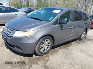 2012 Honda Odyssey EX-L with VIN 5FNRL5H68CB006686, listed as a IAAI auction lot 42039035 with 338,331 mi miles and . Bid and sale history available at carsss.com. Image 17.