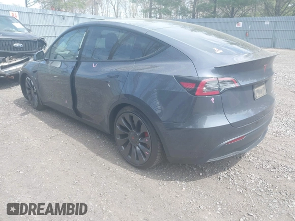 2022 Tesla Model Y Performance with VIN 7SAYGDEF3NF324705, listed as a IAAI auction lot 42076565 with 66,573 mi miles and . Bid and sale history available at DreamBid. Image 3.