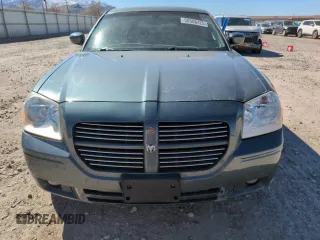 2006 Dodge Magnum SXT z VIN 2D4GZ47V96H344916, wystawiony jako Copart lot #50506425 z przebiegiem 138 323 mil mil oraz Tytuł czysty. Historia ofert i sprzedaży dostępna na DreamBid. Obrazek 5.