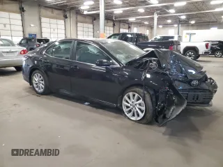 2023 Toyota Camry LE z VIN 4T1R11AK3PU776521, wystawiony jako Copart lot #55927255 z przebiegiem 50 323 mil mil oraz Szkoda całkowita • Salvage title. Historia ofert i sprzedaży dostępna na DreamBid. Obrazek 4.